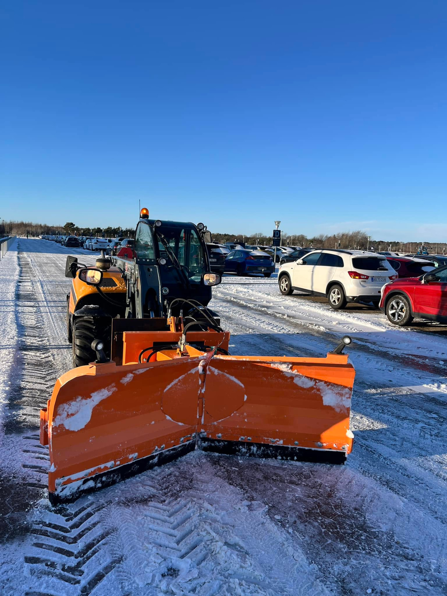 Snerydning af parkeringsplads om vinteren